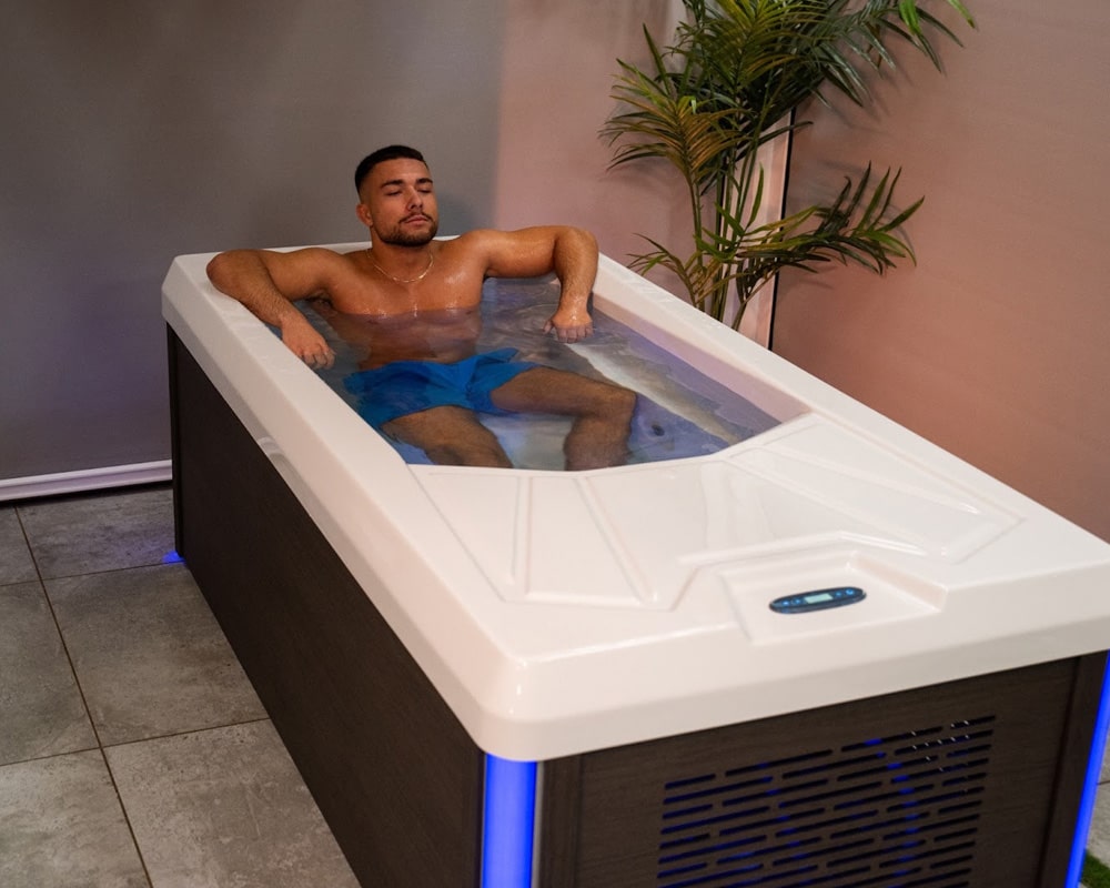 man taking cold plunge